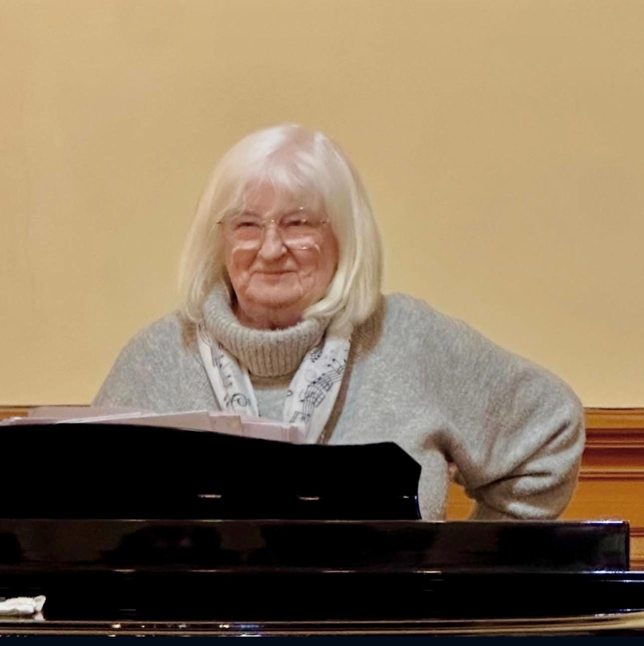 Morag Simpson teaching at a grand piano